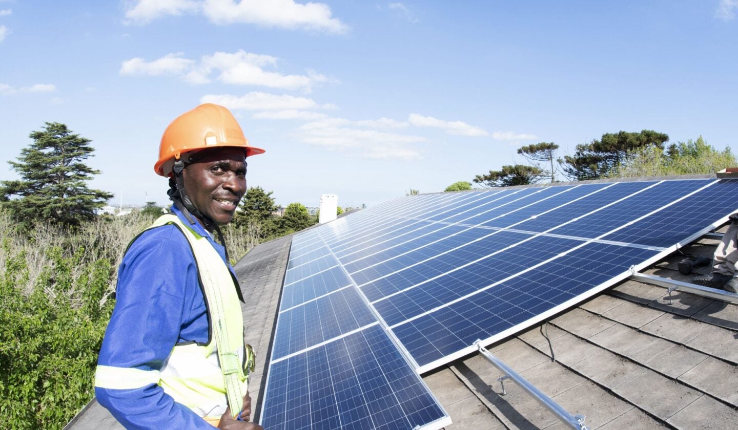 close up portrait man wearing safety equipment on roof