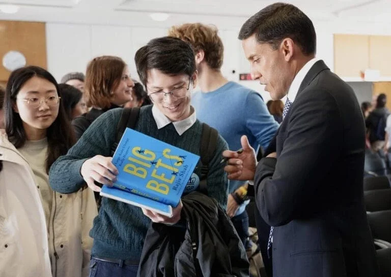 Student discussing Big Bets with Dr. Rajiv J. Shah